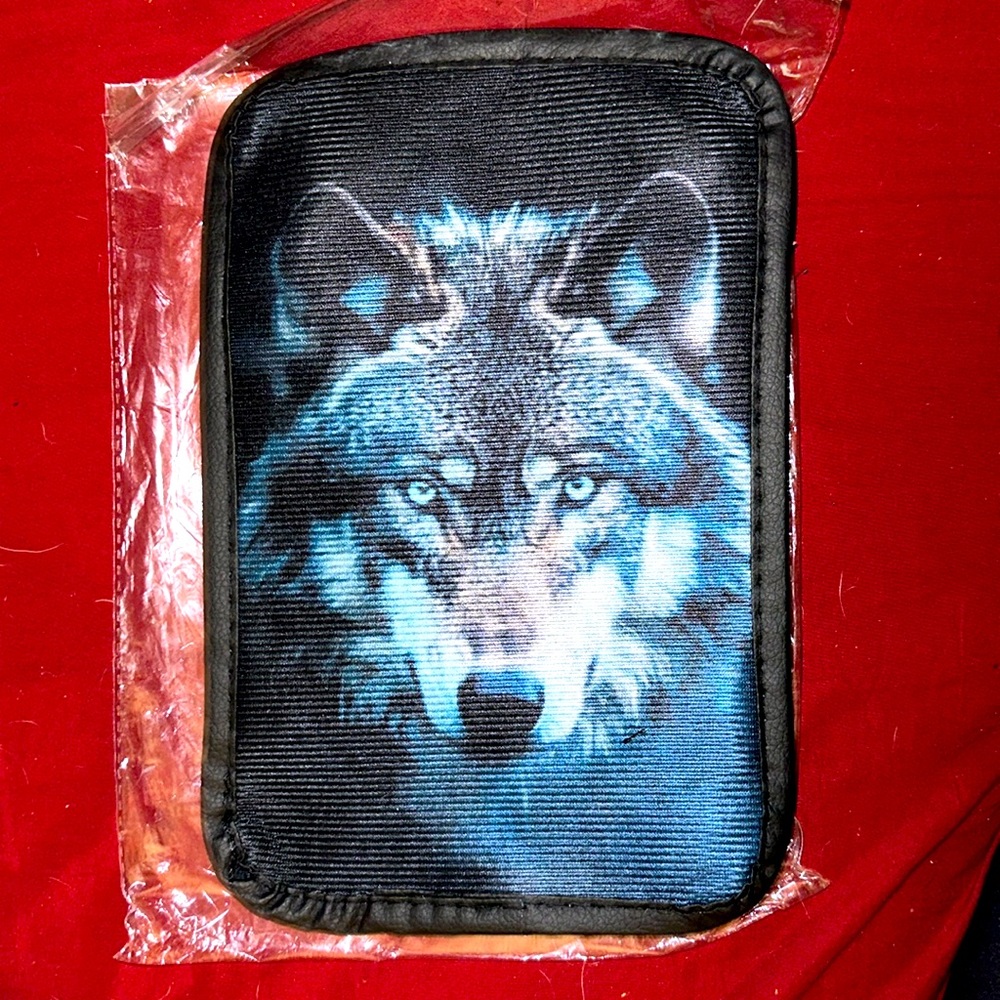 Car armrest cover with Wolf design